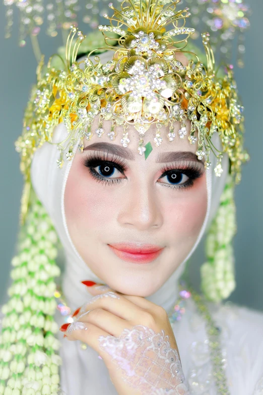 an oriental woman dressed in white with bright hair