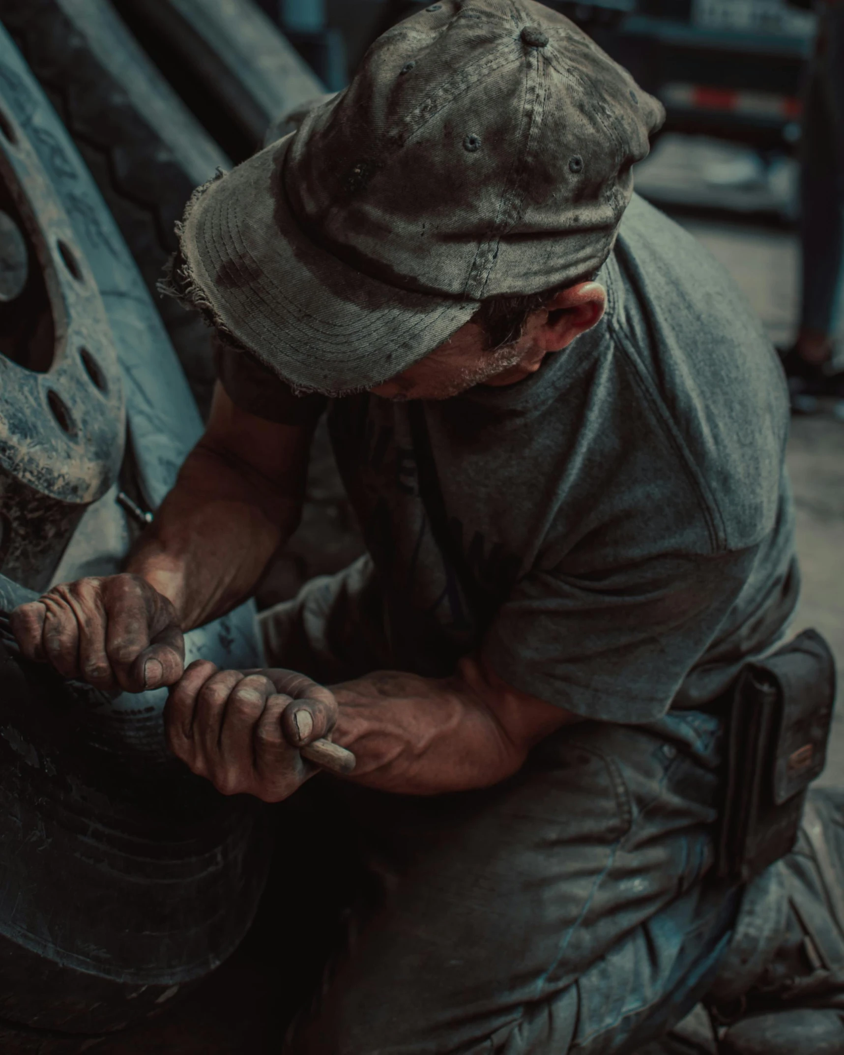 a man is fixing a tire in the process of being worked