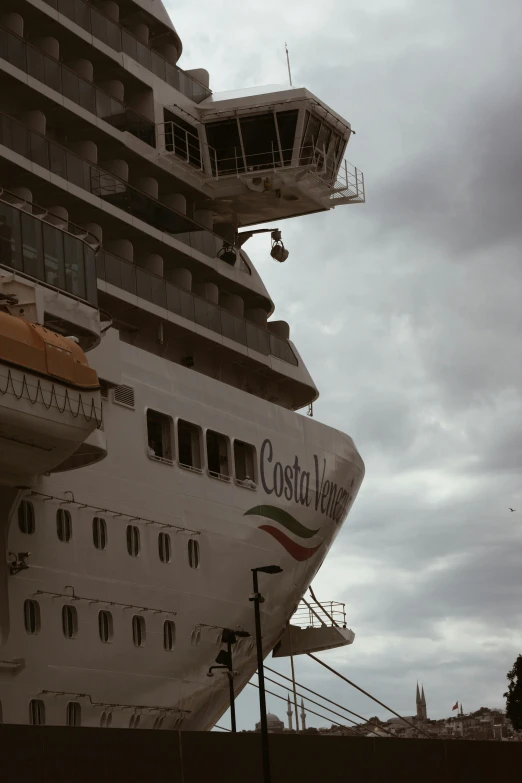 a cruise ship at dock with the top of it sticking out