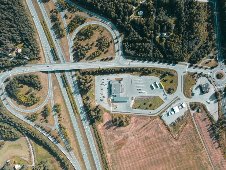 aerial po of empty intersection in large open field