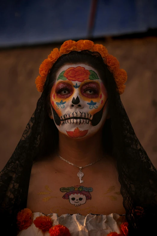 woman wearing mexican day of the dead makeup for dia de muertos