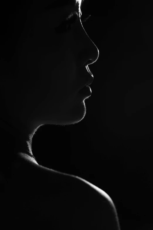 a close up image of a womans face