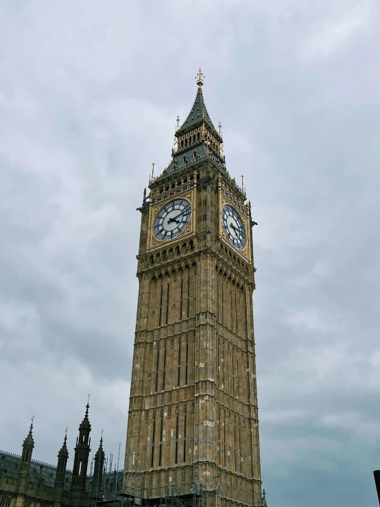 the big ben clock tower towering over the city of london