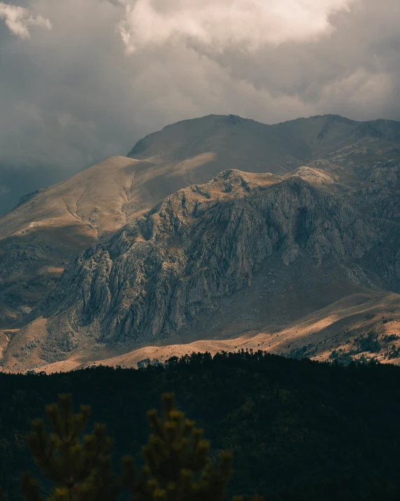 the mountain is very tall with a large peak