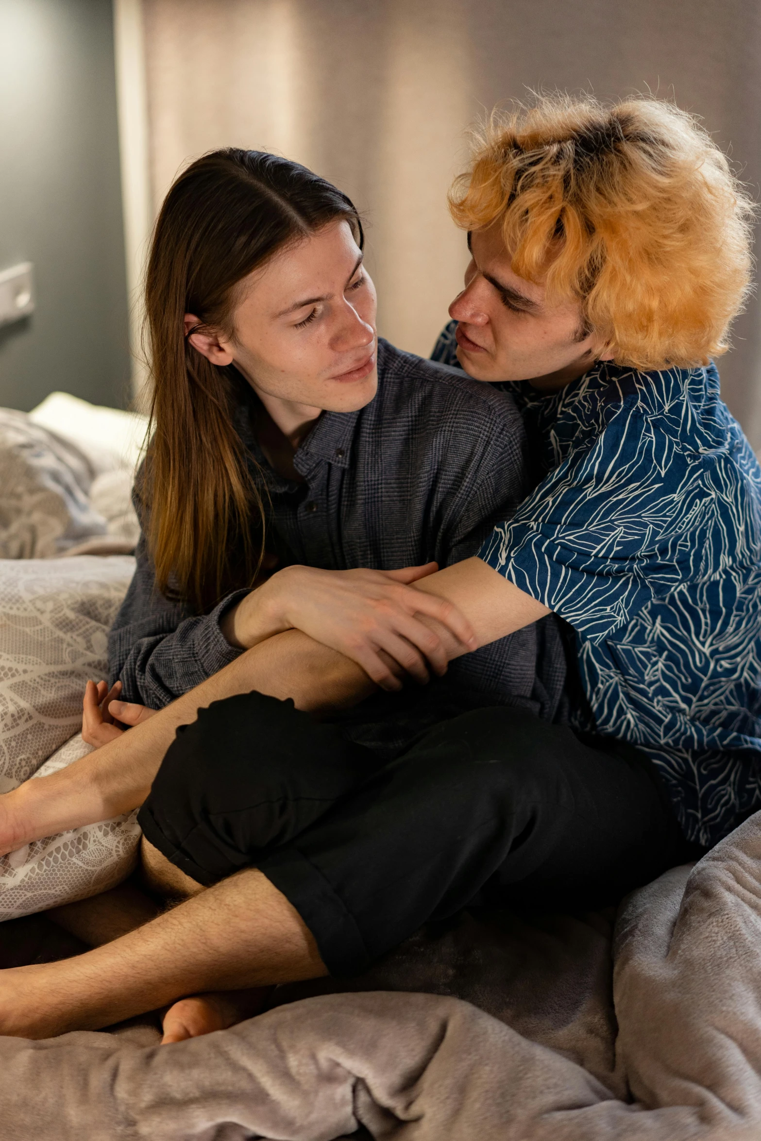 two women sitting on top of each other