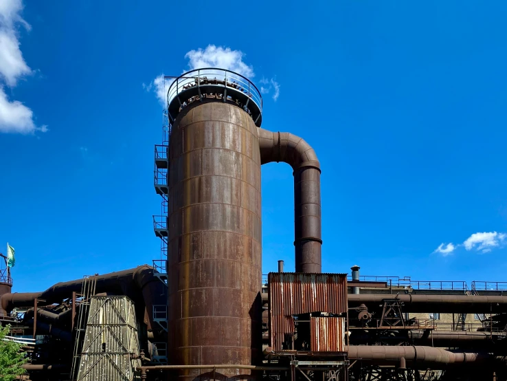 a very large steel plant that is old and rusty
