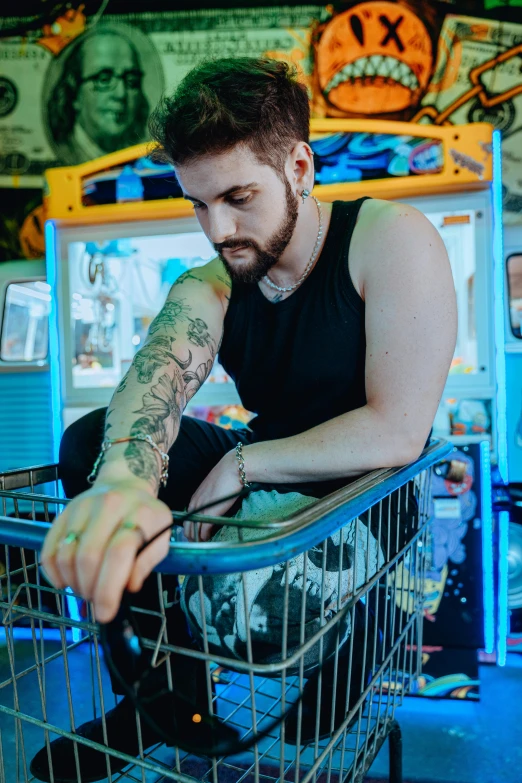 a man that is sitting in a basket