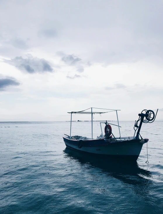 a small boat with a camera mounted on it