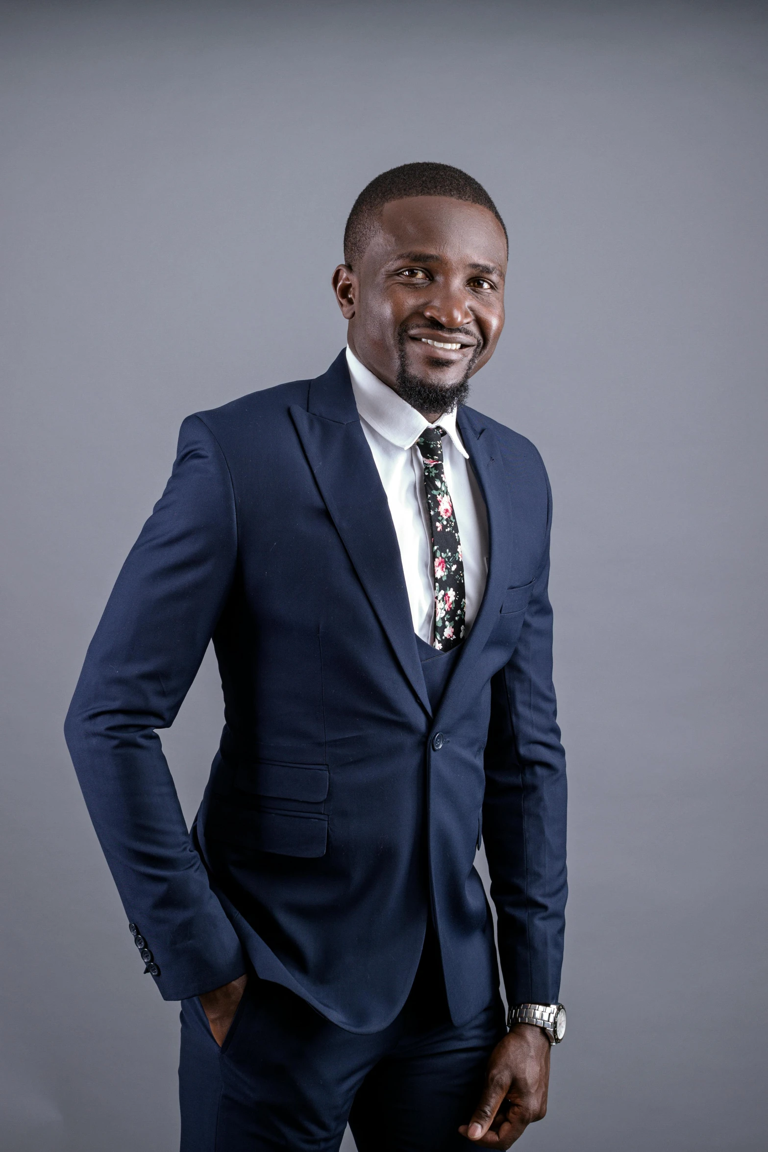 an african american man wearing a suit and tie