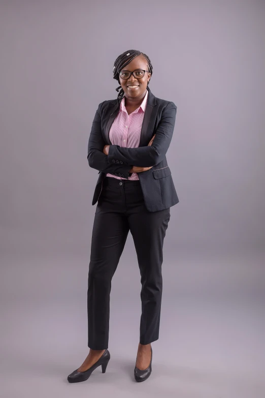 woman in business attire, posing for the camera