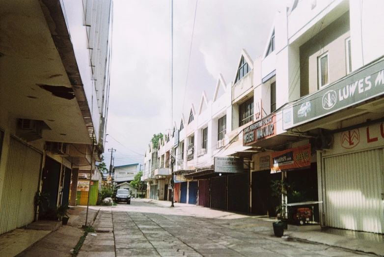 a po of an empty street lined with buildings