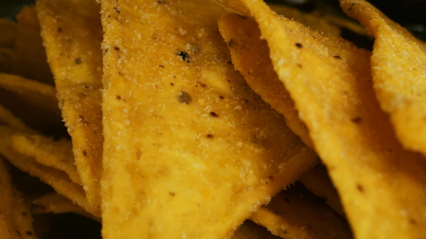 a close up view of crispy tortilla chips