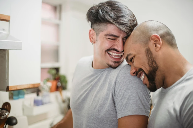 two guys having fun together and laughing