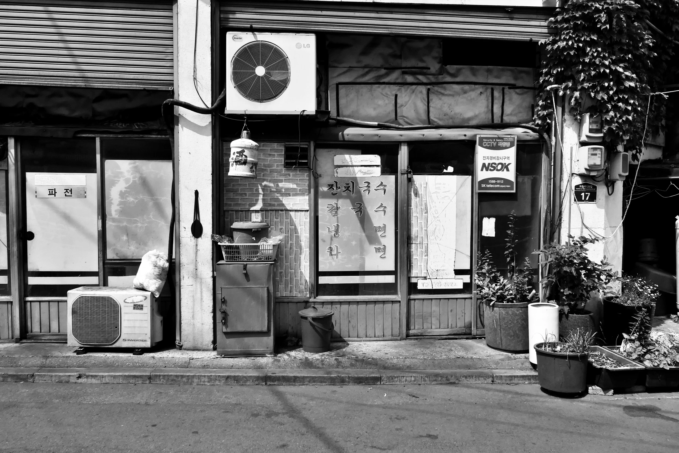 a black and white po of a telephone booth