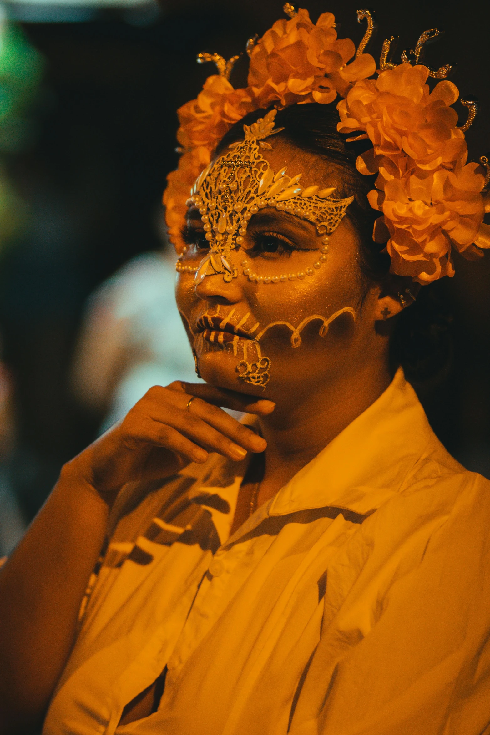 woman with face mask with flowers on head