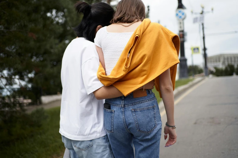 two young people emcing on the side walk