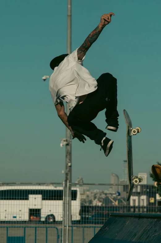 a person on a skateboard performs a trick