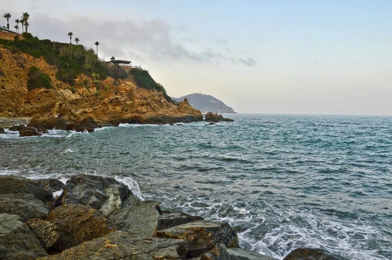 a landscape s of an ocean with waves