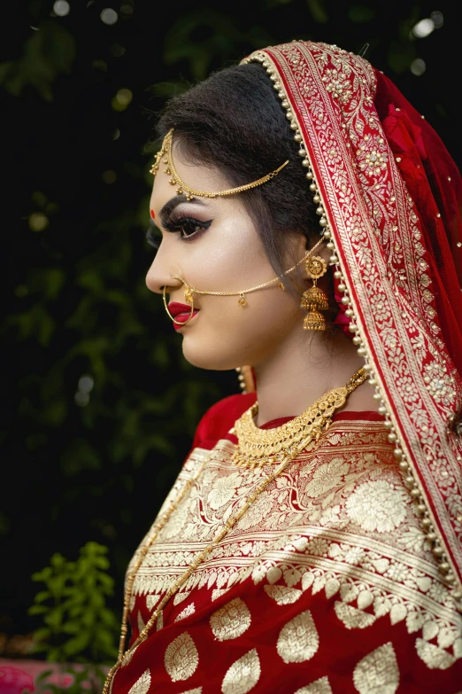 a woman in a red and gold outfit