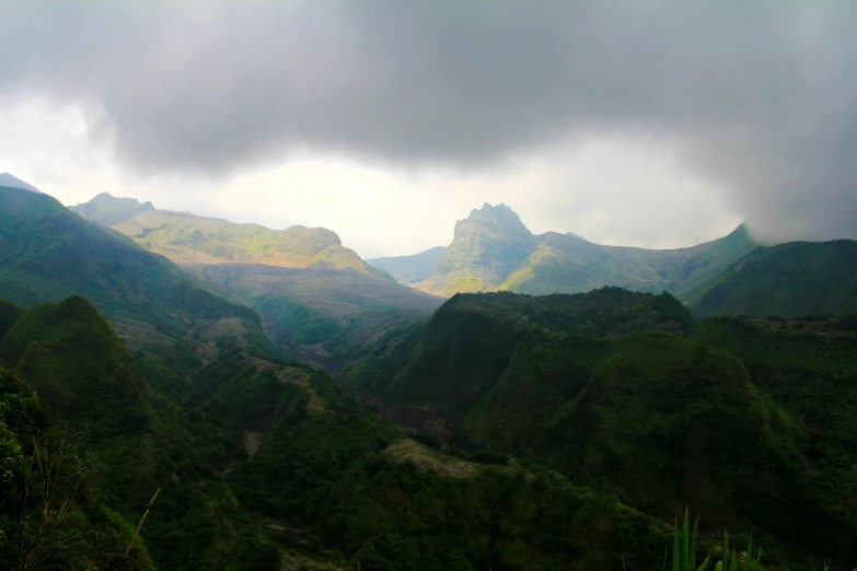 a view of some mountains from a distance