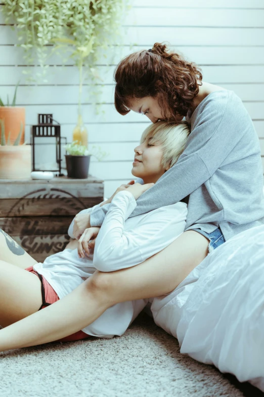 a couple that are sitting on the floor