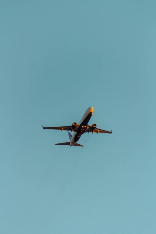 the two black planes fly close together in the blue sky