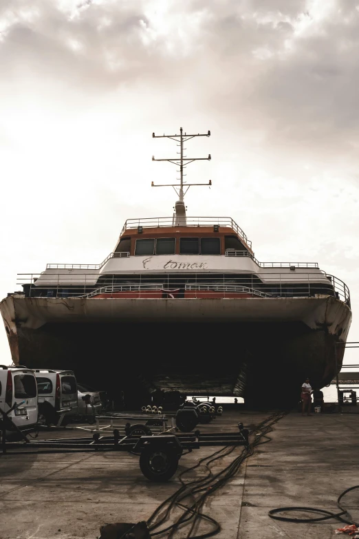 a large boat being constructed in the dock