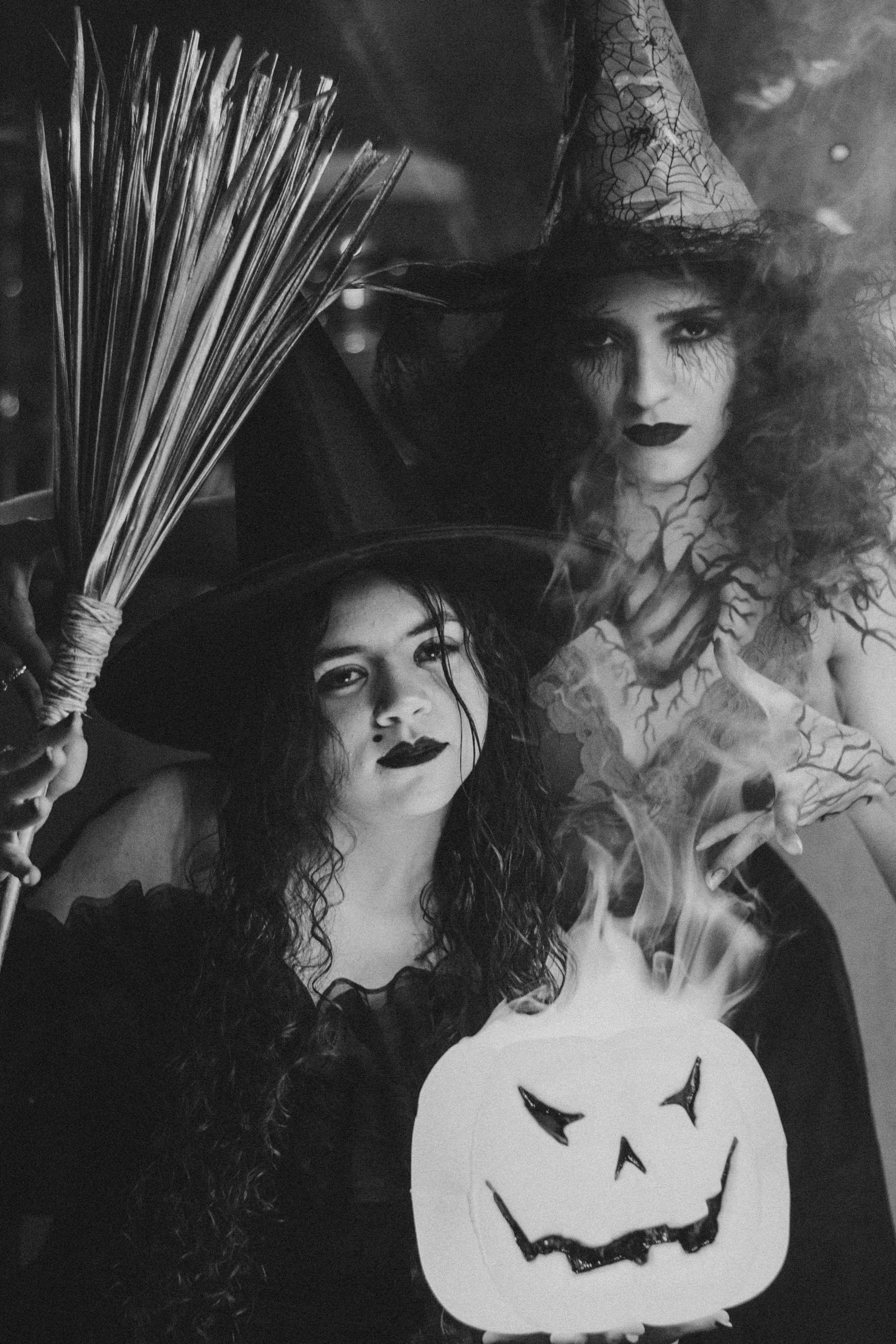 a couple of people that are dressed as witches