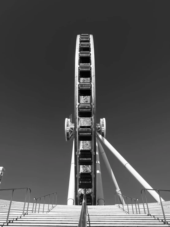 an amut ferris wheel in black and white