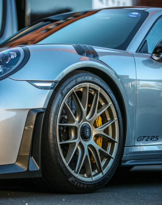 a close up of a very nice car with some nice rims