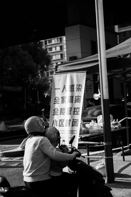 an old man and a  riding a motorcycle