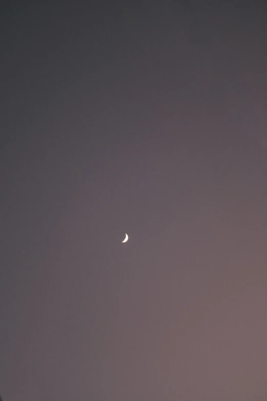 two crescents are seen in the sky at night