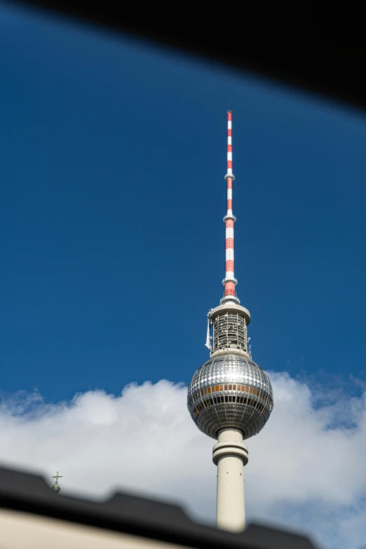 a television tower that has a very tall tower