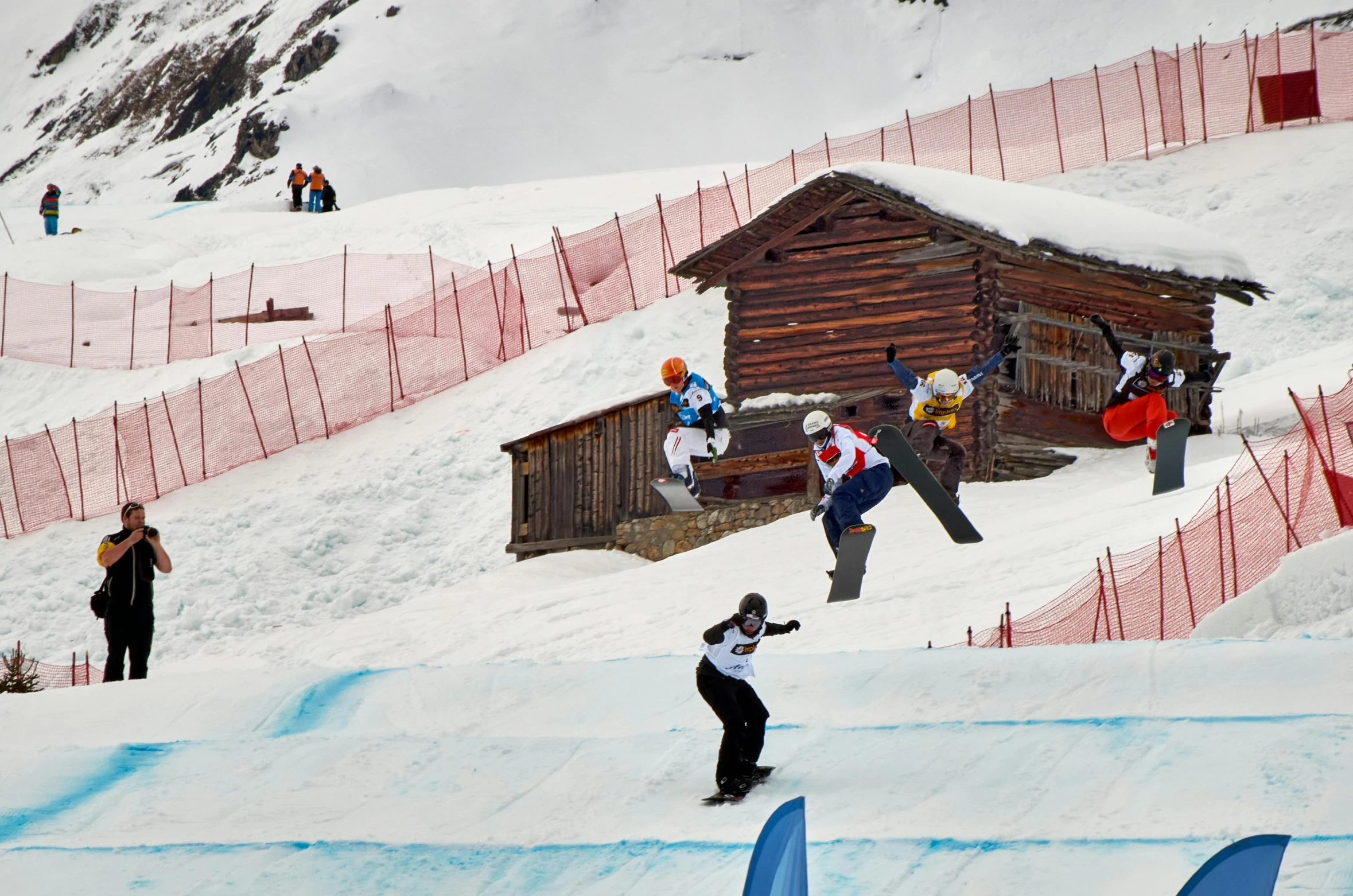 people enjoying winter sports on the snow covered slopes