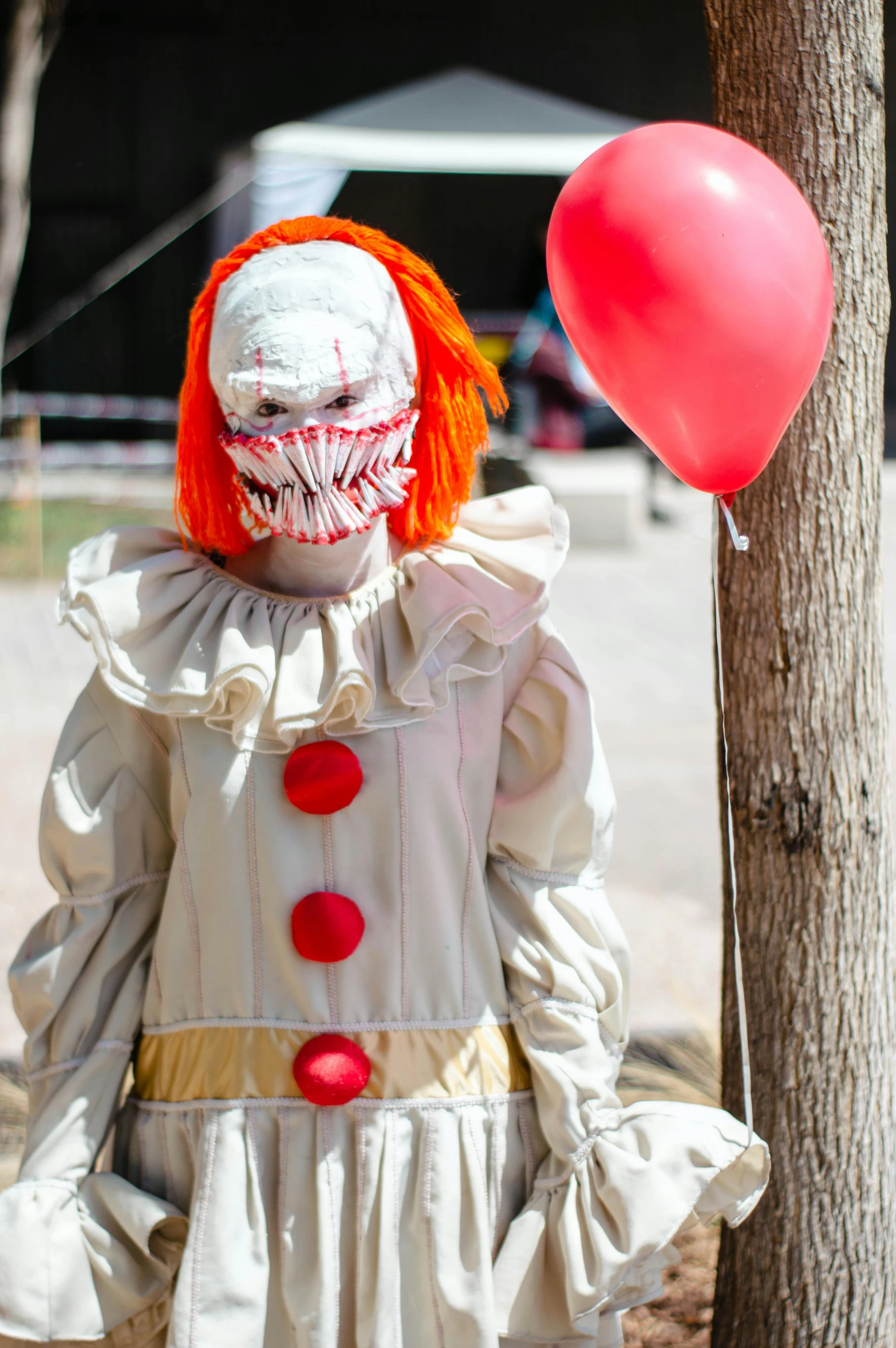 a person in costume with a big nose and hair