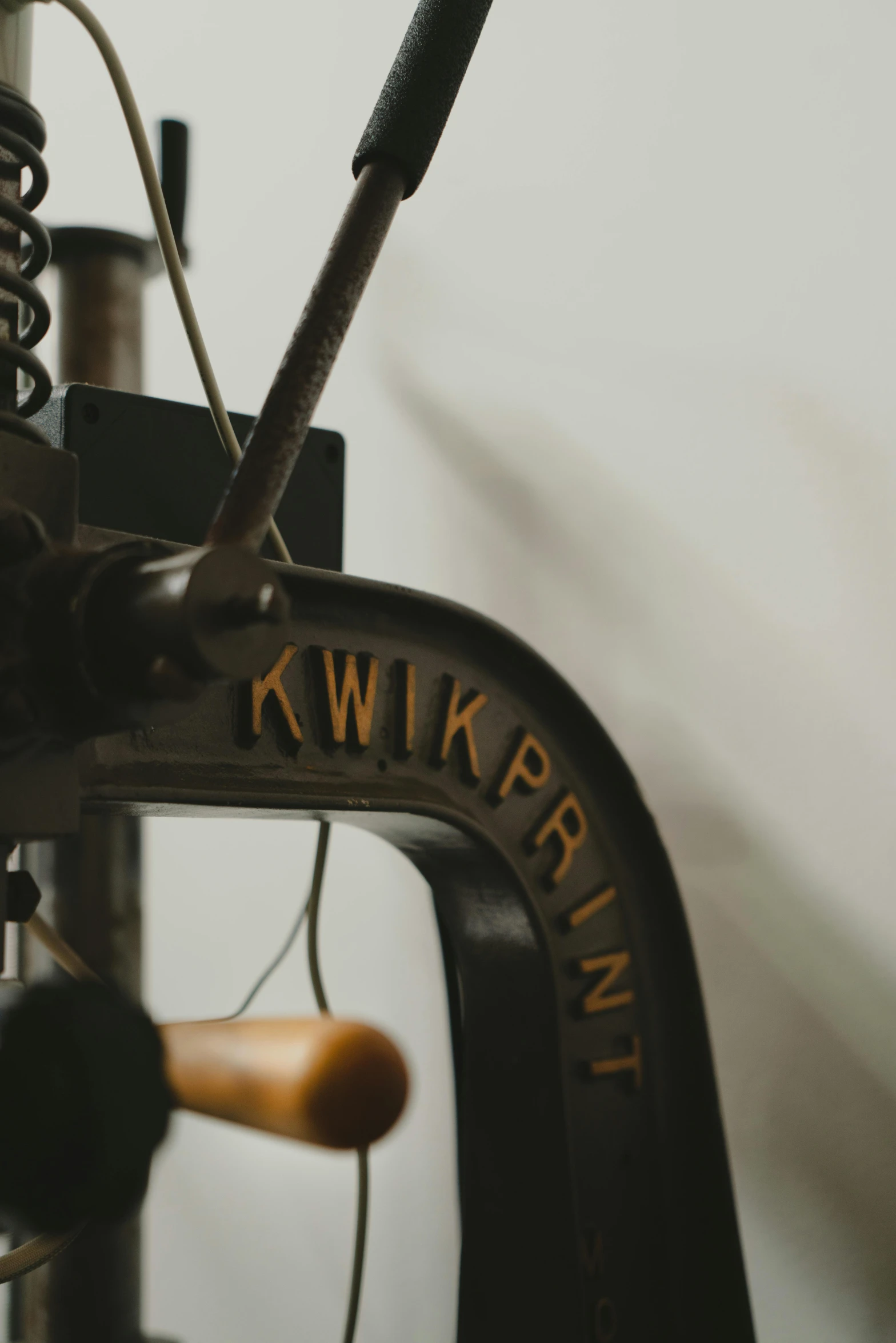 an old antique sewing machine and some cords