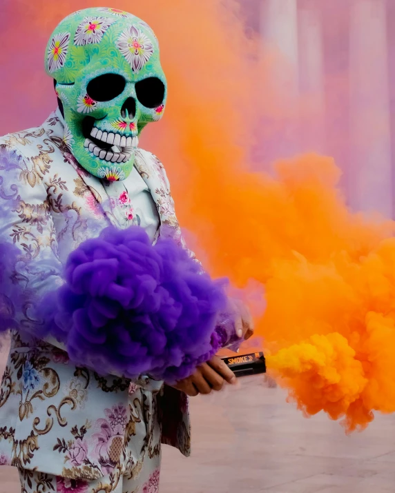 an skeleton in costume holding an object surrounded by colored smoke