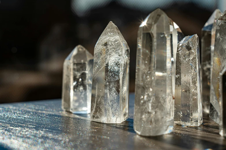 a collection of crystal pieces on a table