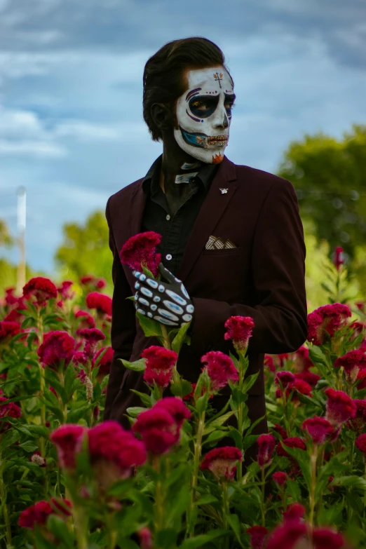 a guy in halloween makeup and a costume