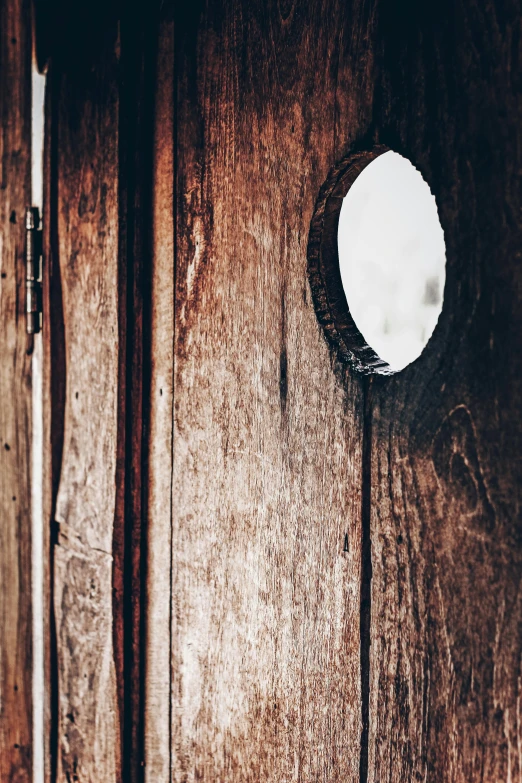 the reflection of a small white object in the mirror