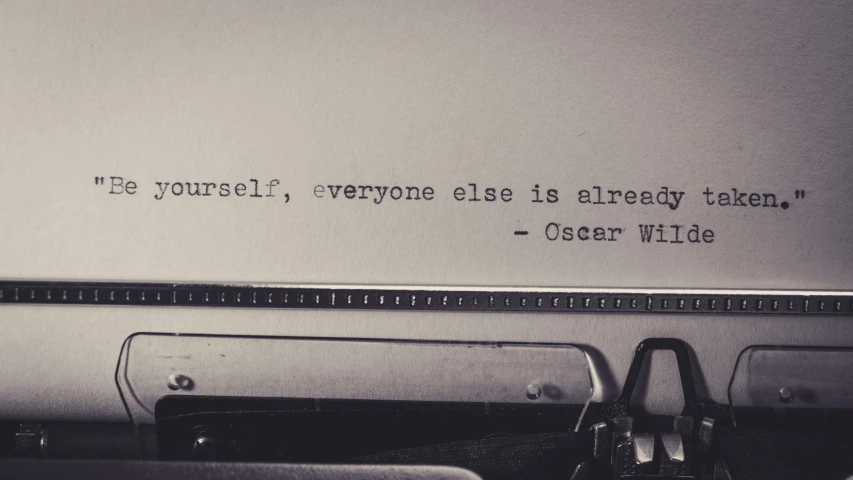 a typewriter with the quote'be yourself, everyone else is already taken - outer wide open '