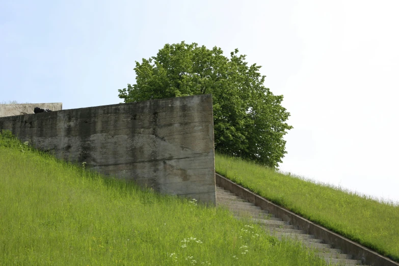 there is a large stone structure on the hill