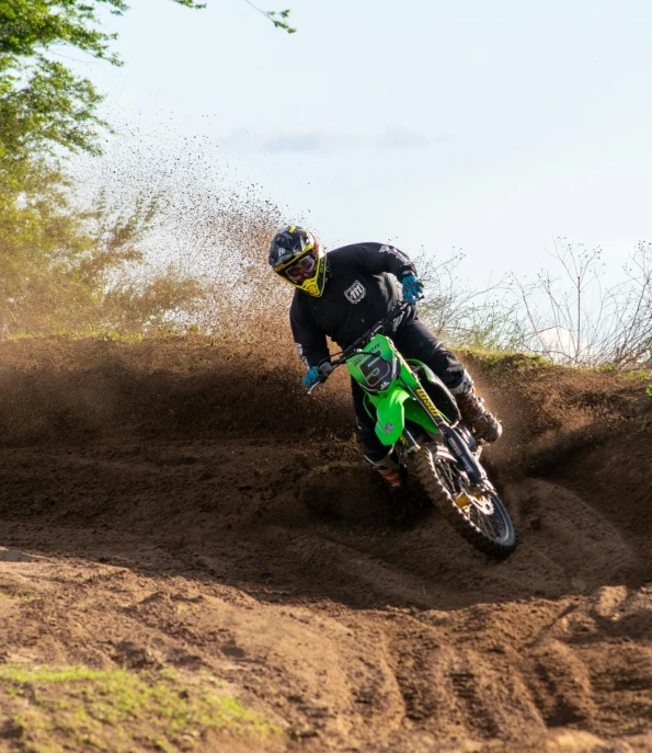 a man is riding his bike down a hill