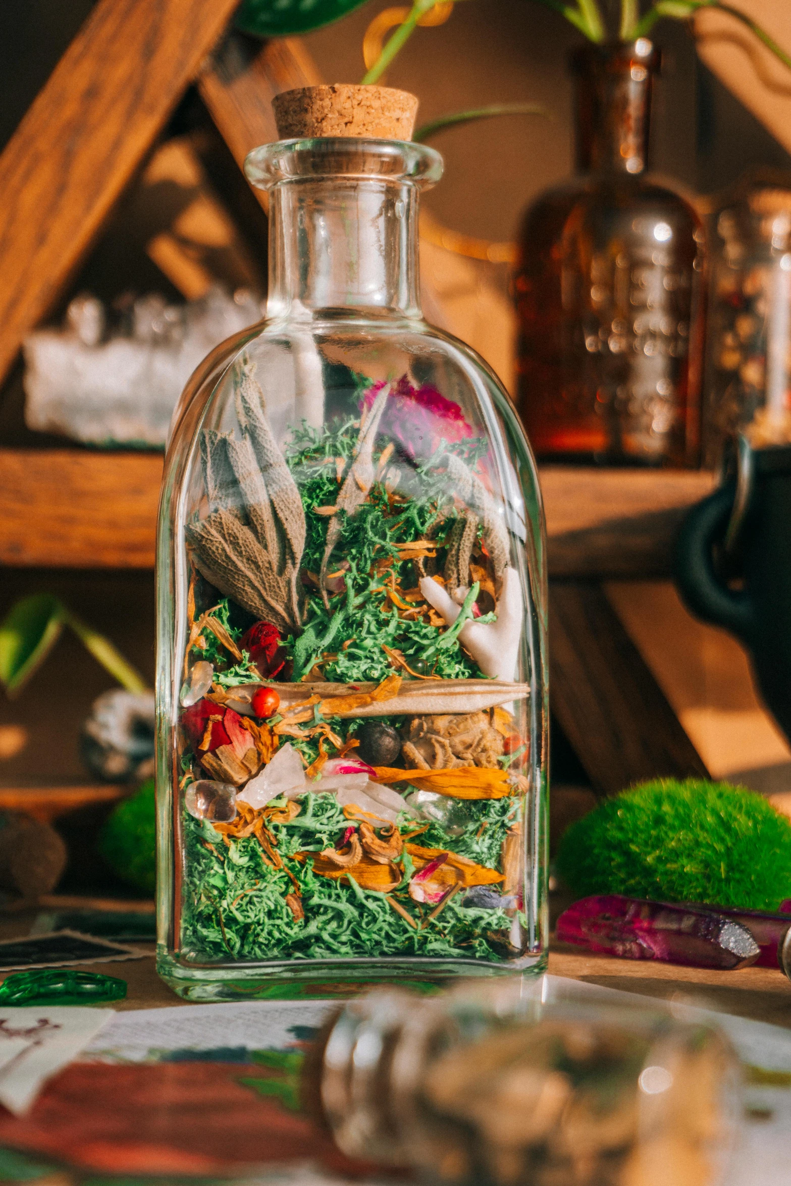 a clear bottle with assorted food items in it