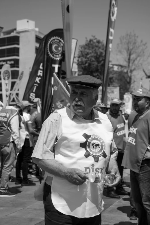 this man is holding up a baseball bat