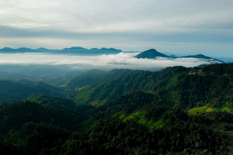 fog rolling over the mountains in the distance