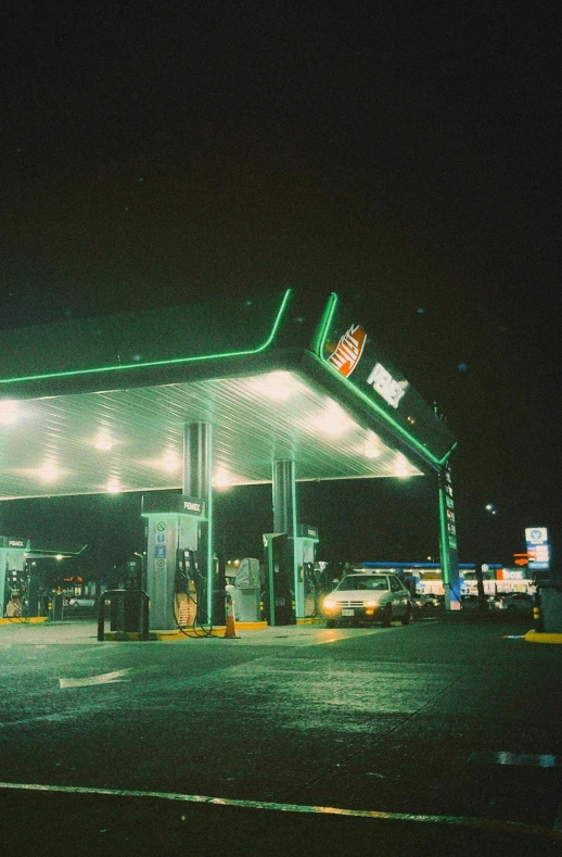 gas station with all the lit up gas pumps