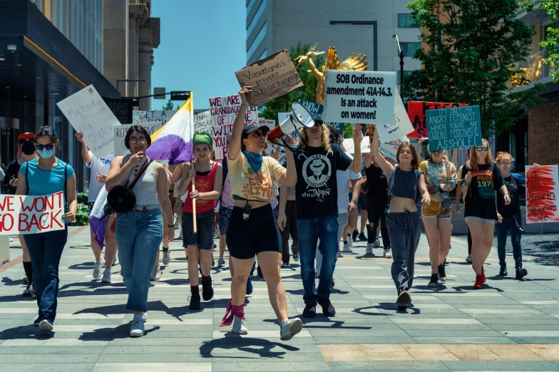 protestors marching on the street during an event