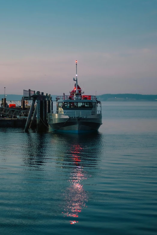 two boats that are sitting in the water