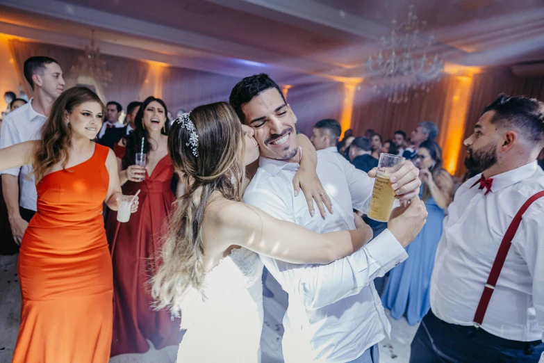 a man and a woman are dancing in a room